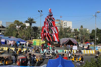  60 يوماً على انطلاق  الاعتصامات  و  الثورة   مستمرة..قداس لـ«الشهداء» في ساحة التحرير ببغداد